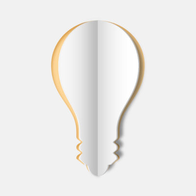 Love Paper styled cutout in the shape of a lightbulb, the central fold lifts the edges slightly to reveal a yellow background.
